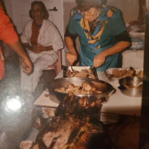 Mom Slicing up the Goods-Noche Buena-1973